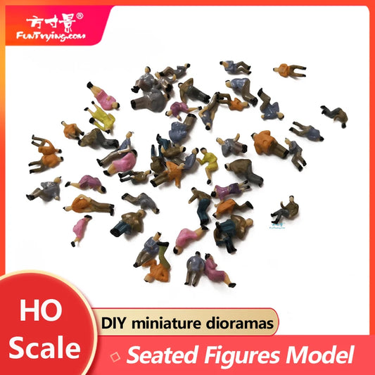 Figures of seated people, H0 scale 